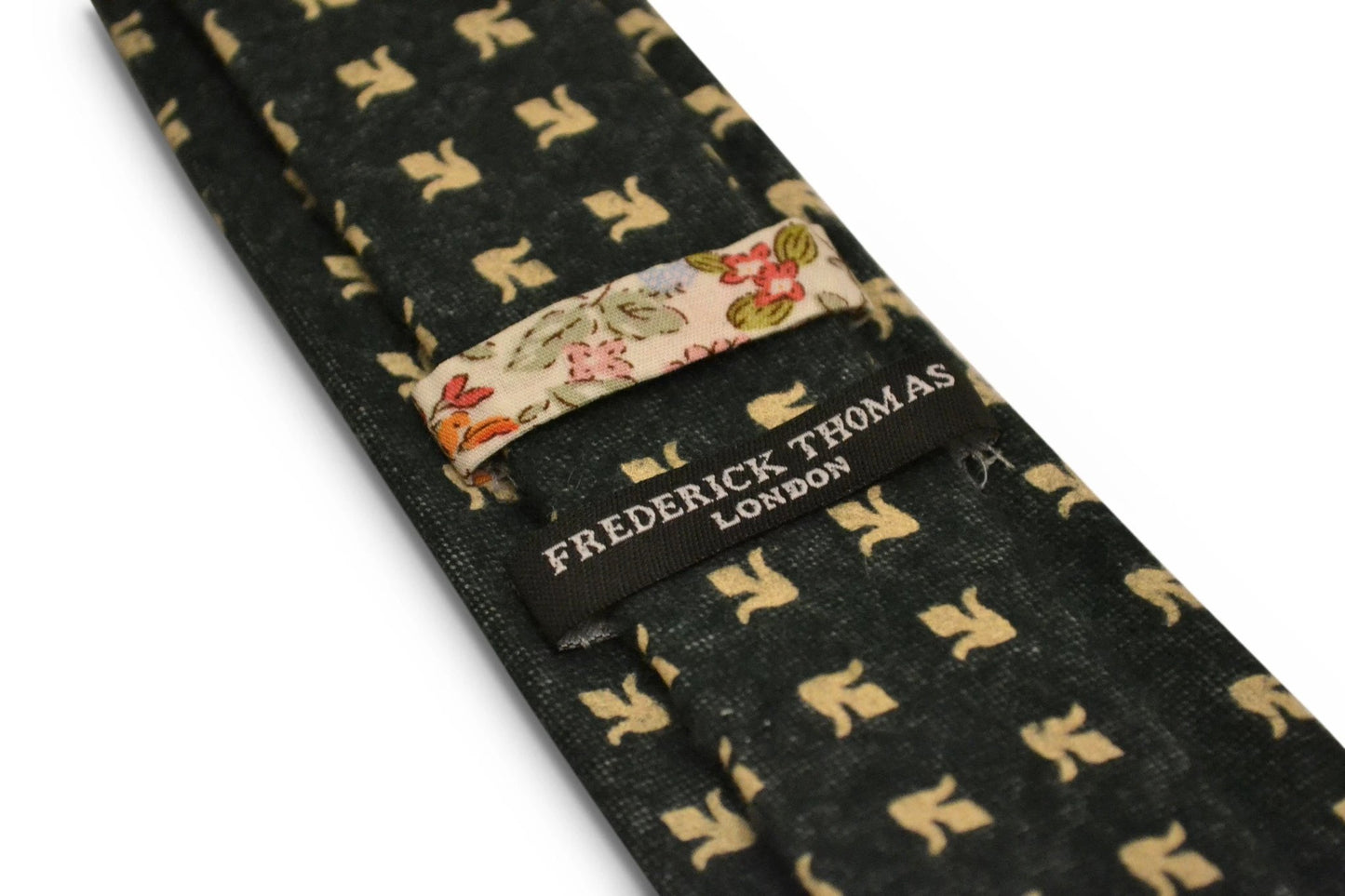 dark grey blue with gold fleur de lis design slim wool tie by Frederick Thomas Handmade Mens Ties