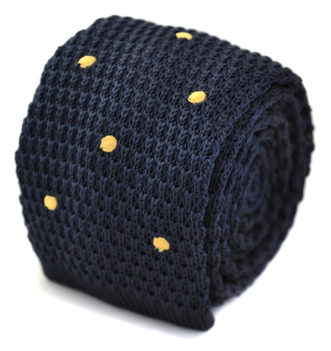 navy blue skinny knitted tie with gold polka dots by Frederick Thomas Handmade Mens Ties