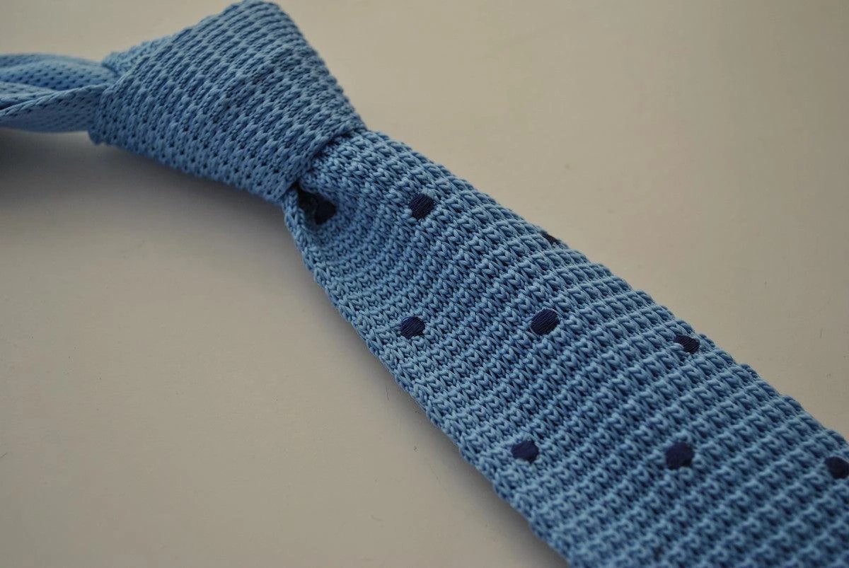light blue skinny knitted tie with dark blue polka dots by Frederick Thomas Handmade Mens Ties