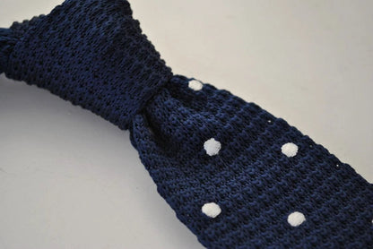 navy blue skinny knitted tie with white polka dots by Frederick Thomas Handmade Mens Ties