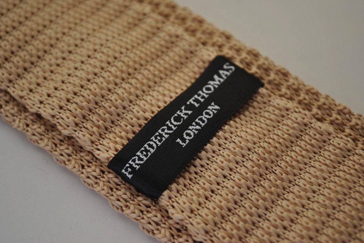 beige skinny knitted tie with white polka dots by Frederick Thomas Handmade Mens Ties