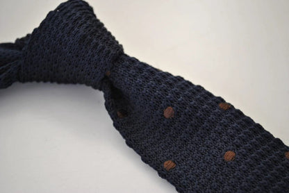 navy blue skinny knitted tie with brown polka dots by Frederick Thomas Handmade Mens Ties