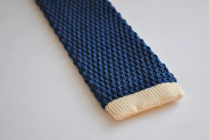 navy blue skinny knitted tie with cream tip by Frederick Thomas Handmade Mens Ties