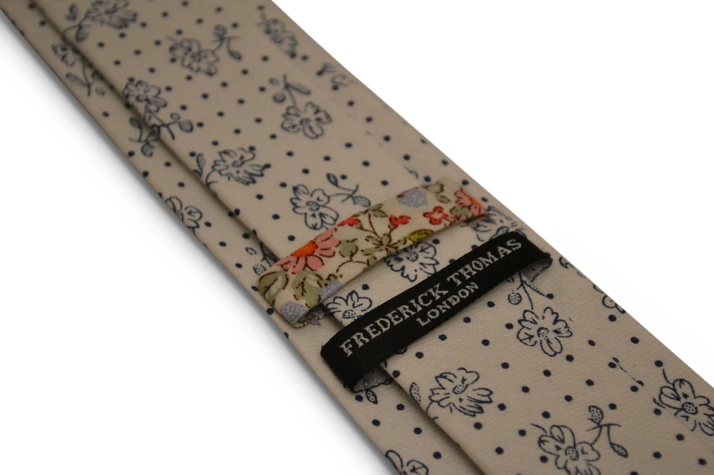ivory white with navy blue floral design cotton tie by Frederick Thomas Handmade Mens Ties