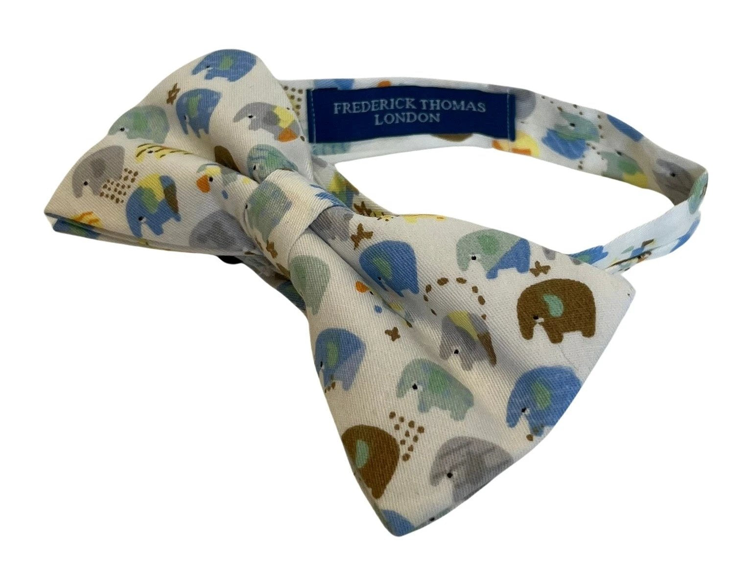 Ivory cotton child's bow tie with colourful elephants design by Frederick Thomas Handmade Mens Ties