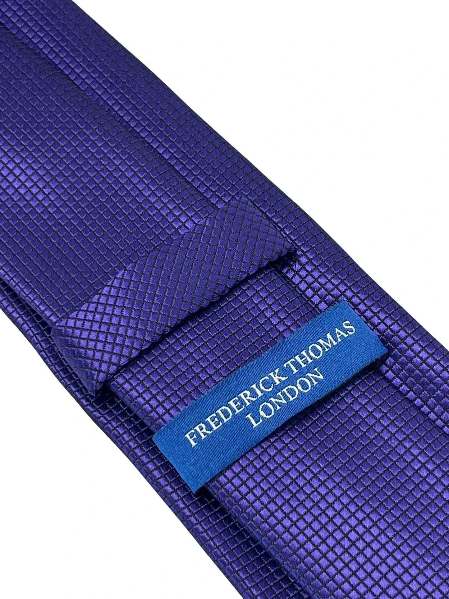 dark cadbury purple tie with subtle squared design by Frederick Thomas Handmade Mens Ties