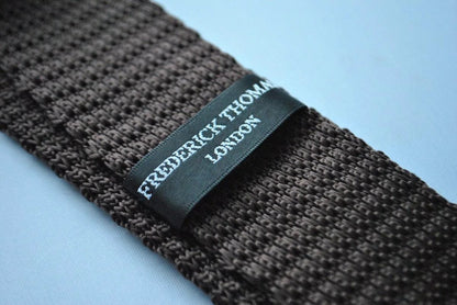 chocolate brown skinny knitted tie with turquoise polka dots by Frederick Thomas Handmade Mens Ties