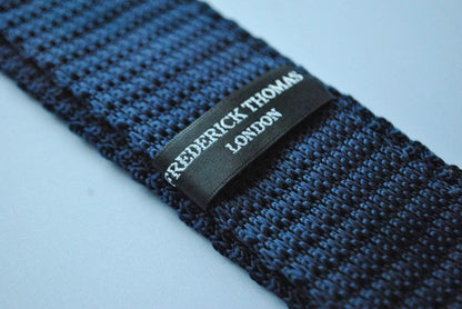 navy blue skinny knitted tie with bright pink polka dots by Frederick Thomas Handmade Mens Ties