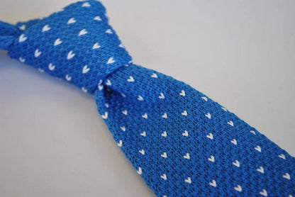 bright royal blue skinny knitted tie with white polka dots by Frederick Thomas Handmade Mens Ties