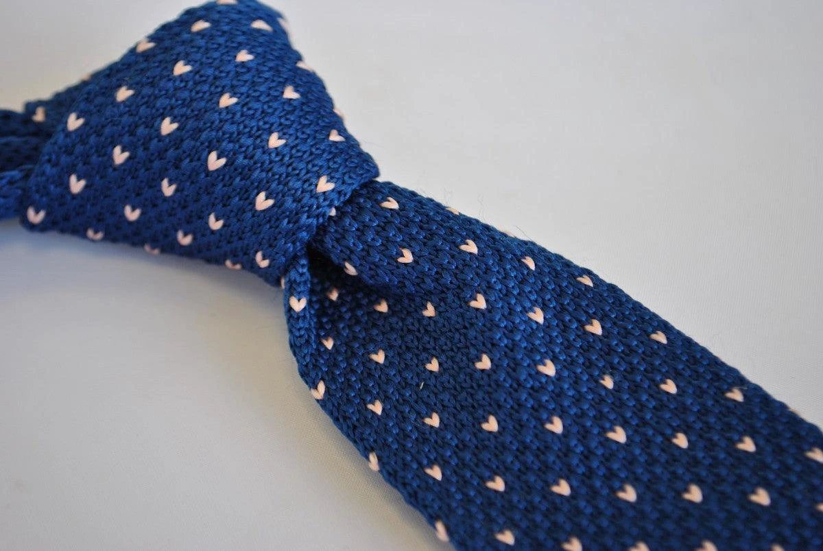 navy blue skinny knitted tie with pink polka dots by Frederick Thomas Handmade Mens Ties