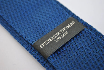 navy blue skinny knitted tie with pink polka dots with pointed end by Frederick Thomas Handmade Mens Ties