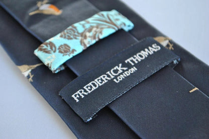 navy tie with embroidered robin design by Frederick Thomas Handmade Mens Ties