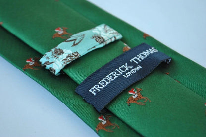 dark green tie with horse racing design by Frederick Thomas Handmade Mens Ties