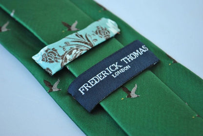 dark green tie with flying duck design by Frederick Thomas Handmade Mens Ties